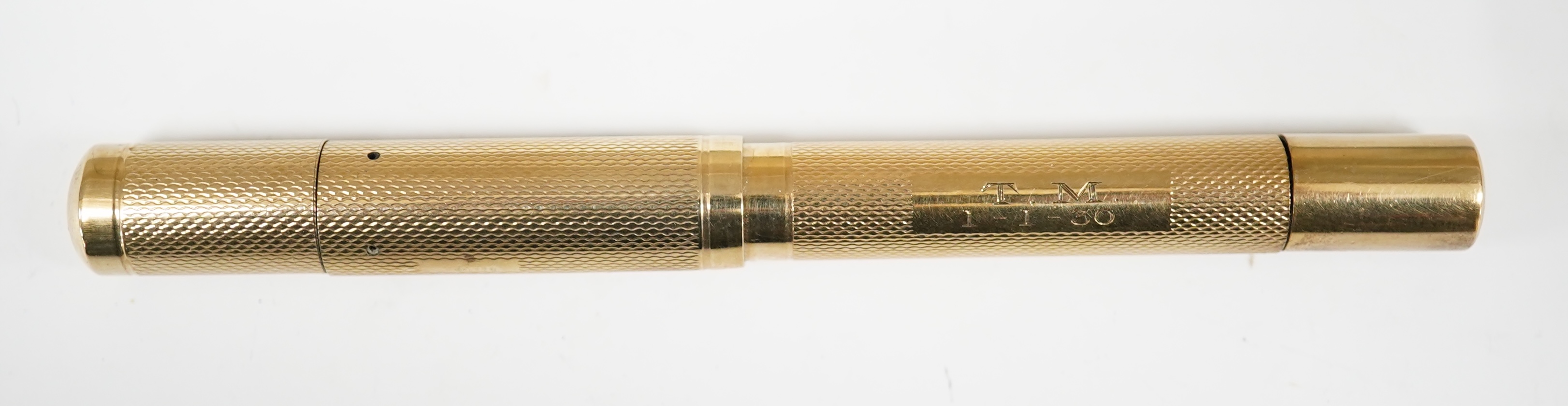 A De La Rue Onoto 9ct. gold piston fill fountain pen, appears to be working with provision for cap clip